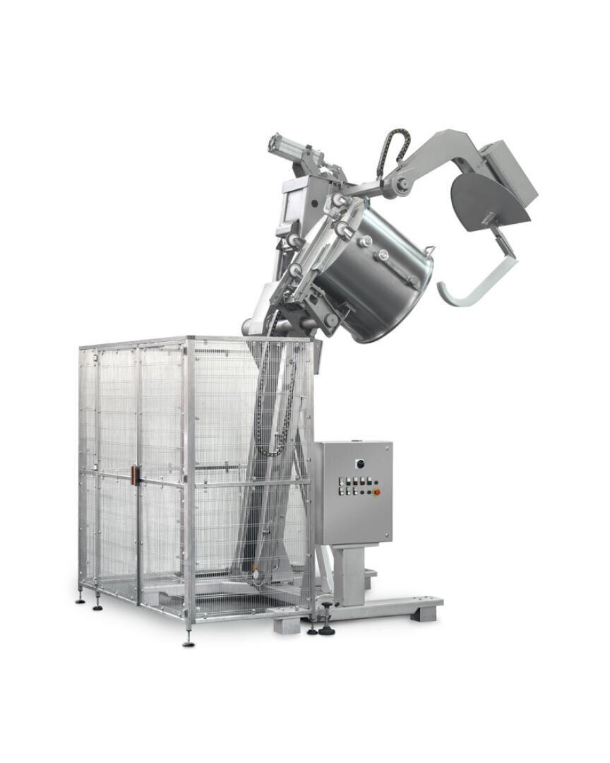 A large industrial machine with a metal cage enclosure and control panel is shown lifting and tilting a stainless steel mixing bowl using mechanical arms.