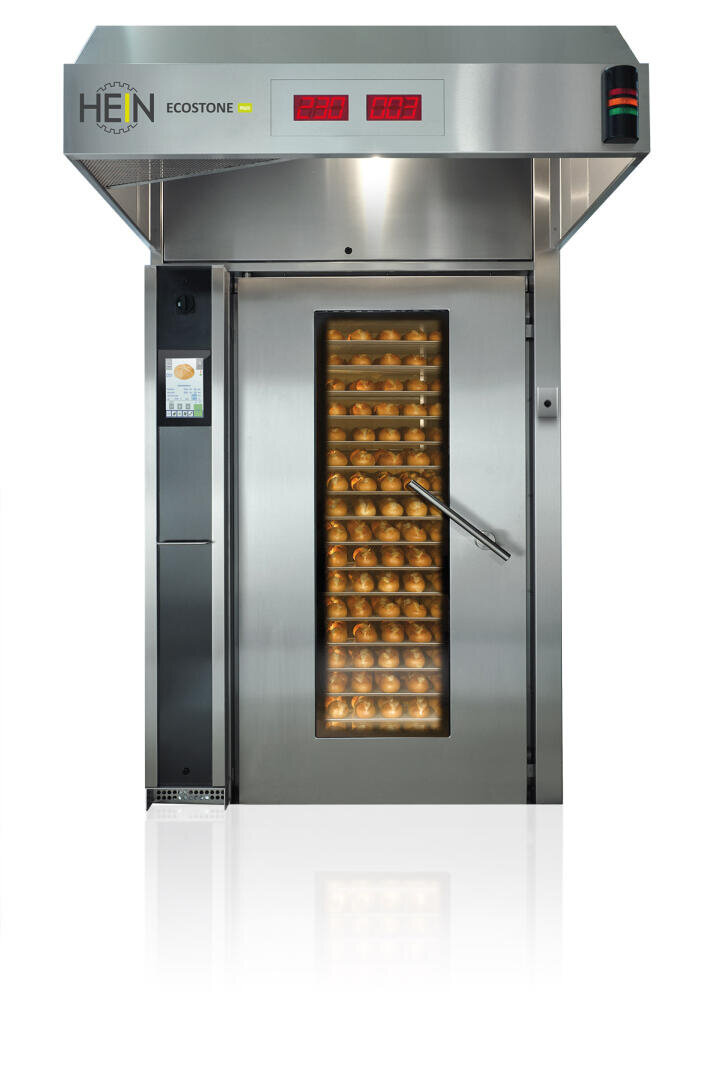 Ein kommerzieller Backofen aus rostfreiem Stahl mit einer Glastür, in der sich Backbleche befinden, und einer digitalen Temperaturanzeige auf der Oberseite. Der Ofen ist mit "Hein Ecostone" beschriftet.