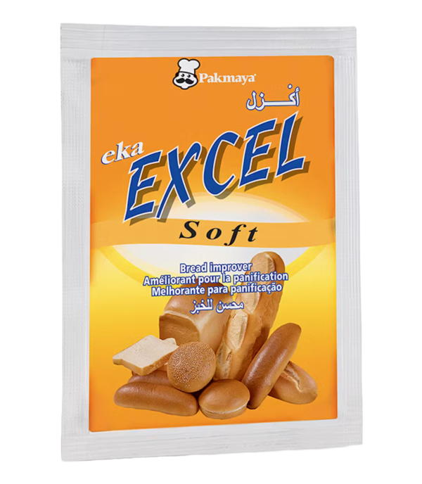 A packet of Pakmaya Eka Excel Soft bread improver, featuring images of various bread types on the front and text in English, French, Portuguese, and Arabic, all on an orange and white background.