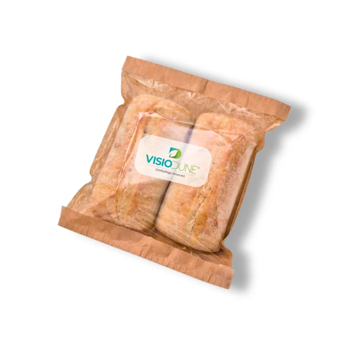 Zwei Brotscheiben sind in einer braunen Papiertüte mit klarem Fenster und einem Etikett mit der Aufschrift „Visiodune Emballage Innovant“ auf weißem Hintergrund verpackt.